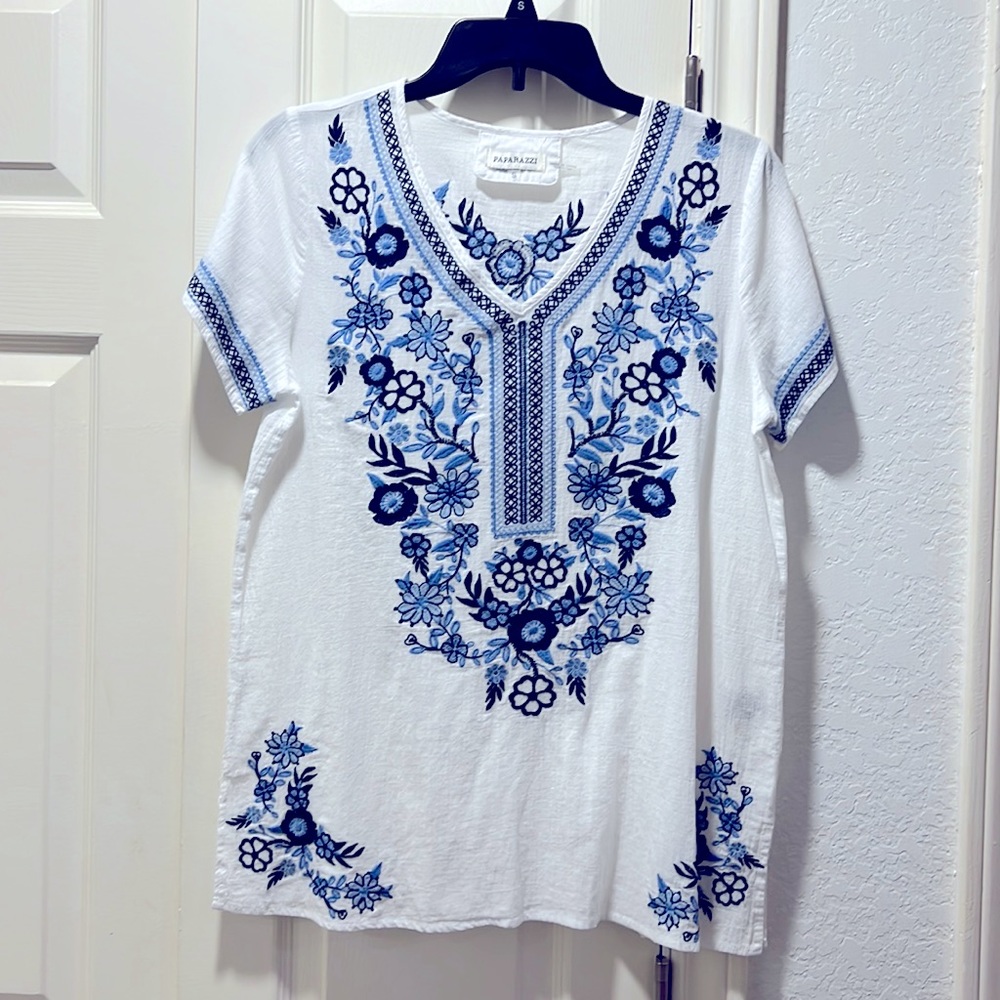 Embroidered blouse. Light weight and great in the summer.